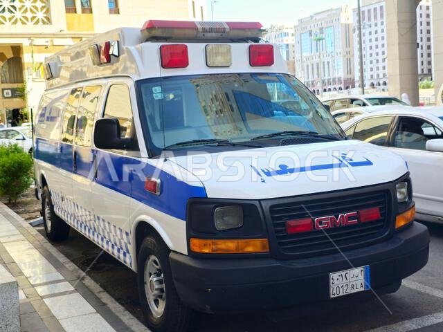 Medina, Saudi Arabia, June 26 2024: GMC ambulance car vehicle, belongs to medical office for pilgrims of the Republic of Indonesia, medical care for t