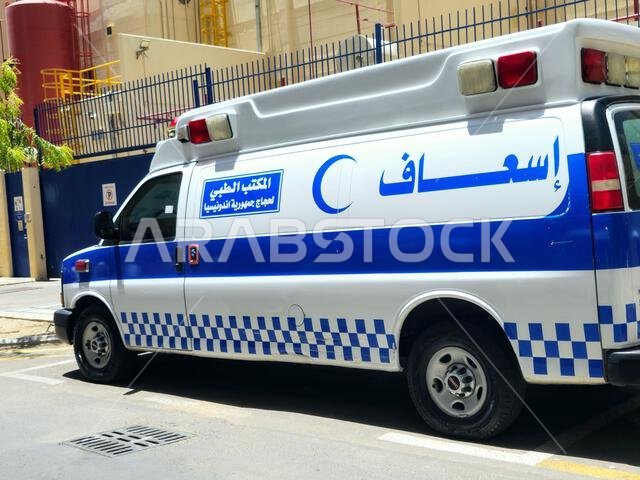 Medina, Saudi Arabia, June 28 2024: GMC ambulance car vehicle, belongs to medical office for pilgrims of the Republic of Indonesia, medical care for t Medina, Saudi Arabia, June 28 2024: GMC ambulance car vehicle, belongs to medical office for pilgrims of the Republic of Indonesia, medical care for t