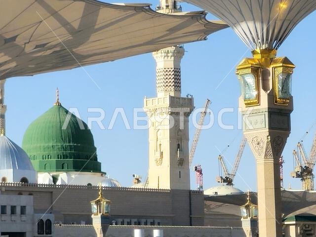 Medina, Saudi Arabia, June 26 2024: The prophet's mosque new extension with lots of crane towers and constructions in the background, new extensions t