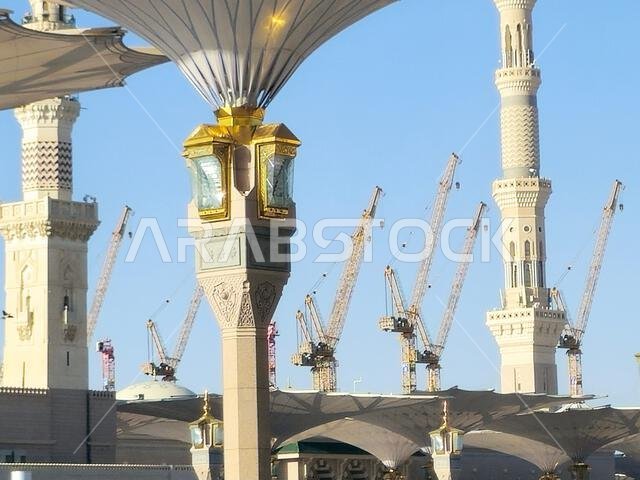 Medina, Saudi Arabia, June 26 2024: The prophet's mosque new extension with lots of crane towers and constructions in the background, new extensions t