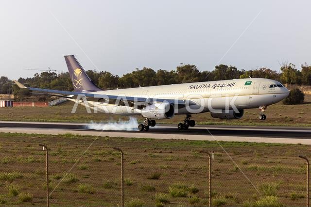Saudia - Saudi Arabian Airlines Airbus A330-343 (REG: HZ-AQ23) arriving in the early morning for maintenance.