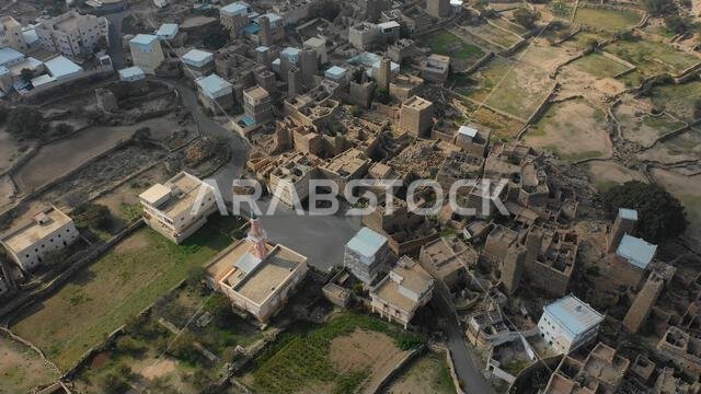 Aerial view of stone and mud houses with slates in al Khalaf village, Asir province, Sarat Abidah, Saudi Arabia Aerial view of stone and mud houses with slates in al Khalaf village, Asir province, Sarat Abidah, Saudi Arabia