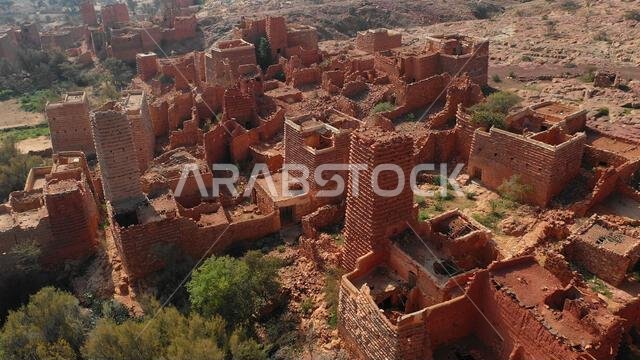 Aerial view of red stone and mud houses with slates in a village, Asir province, Sarat Abidah, Saudi Arabia