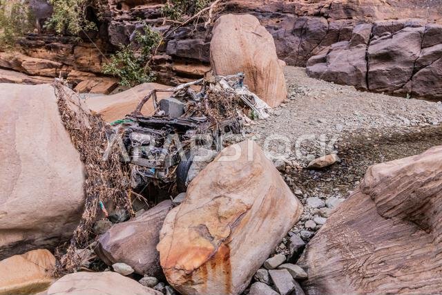 Car wreck in Wadi Lajab gorge, Saudi Arabia