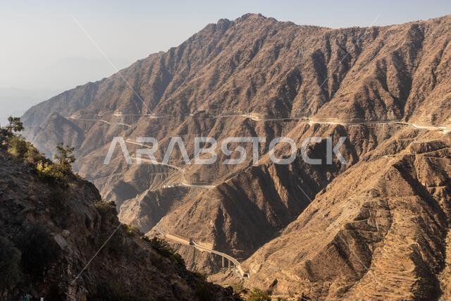 Deep valley with King Fahd Road in Sarawat mountains near Al Baha, Saudi Arabia Deep valley with King Fahd Road in Sarawat mountains near Al Baha, Saudi Arabia