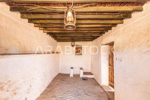 FARASAN, SAUDI ARABIA - NOVEMBER 22, 2021: Interior of a house in Al Qassar heritage village on Farasan island, Saudi Arabia