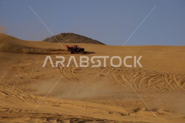 Nawan , Saudi Arabia  Jan 7 2023: 4x4 cars drift across Saudi Arabia’s striking sand desert. The vehicles perform thrilling maneuvers, on sand dunes