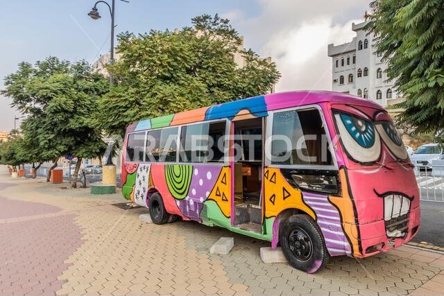 ABHA, SAUDI ARABIA - NOVEMBER 19, 2021: Colorful bus in the Art Street in Abha, Saudi Arabia