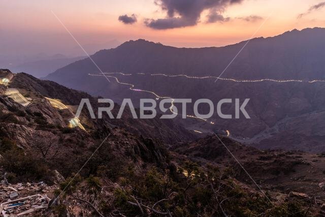 Evening view of a deep valley with King Fahd Road near Al Baha, Saudi Arabia Evening view of a deep valley with King Fahd Road near Al Baha, Saudi Arabia