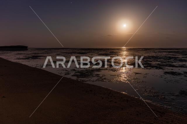 Moon shining at a coast of Farasan island, Saudi Arabia
