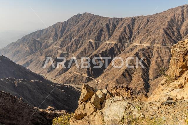Deep valley with King Fahd Road in Sarawat mountains near Al Baha, Saudi Arabia Deep valley with King Fahd Road in Sarawat mountains near Al Baha, Saudi Arabia