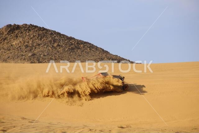 Nawan , Saudi Arabia  Jan 7 2023: 4x4 cars drift across Saudi Arabia’s striking sand desert. The vehicles perform thrilling maneuvers, on sand dunes