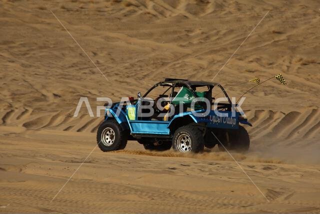 Nawan , Saudi Arabia  Jan 7 2023: 4x4 cars drift across Saudi Arabia’s striking sand desert. The vehicles perform thrilling maneuvers, on sand dunes