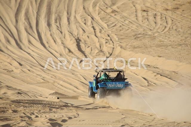Nawan , Saudi Arabia  Jan 7 2023: 4x4 cars drift across Saudi Arabia’s striking sand desert. The vehicles perform thrilling maneuvers, on sand dunes