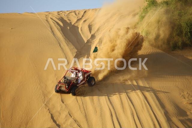 Nawan , Saudi Arabia  Jan 7 2023: 4x4 cars drift across Saudi Arabia’s striking sand desert. The vehicles perform thrilling maneuvers, on sand dunes