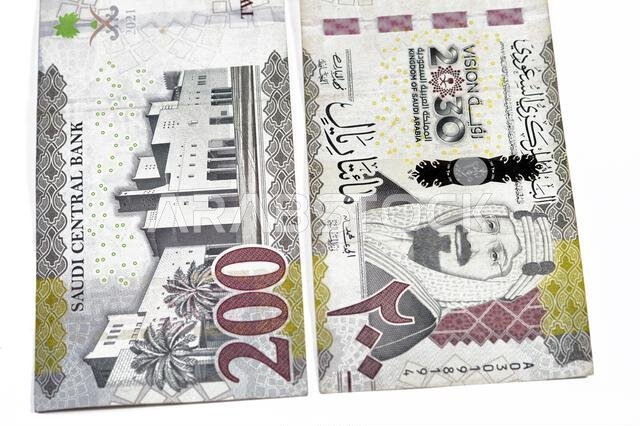 200 SAR two hundred Saudi Arabian riyals banknote, features King Abdul Aziz Al Saud, Saudi kingdom vision of year 2030 and Qasr Al Hukm in Riyadh City