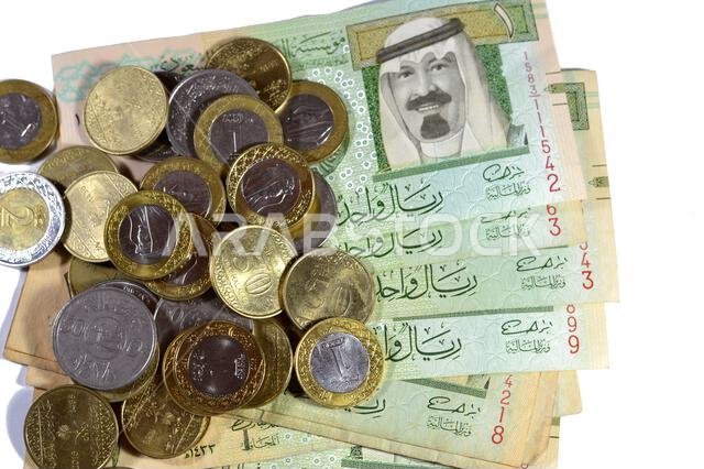 an old Saudi Arabia banknote bill, one 1 Riyal SAR features AbdullAllah bin Abdulaziz, Custodian of the Two Holy Mosques and the King of Saudi Arabia