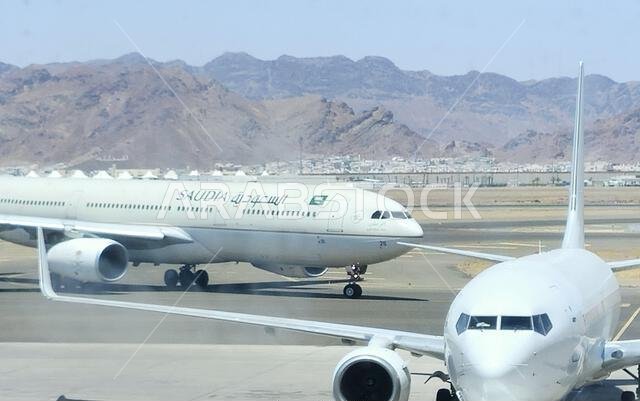 Medina, Saudi Arabia, June 29 2024: Saudi Airlines plane in Prince Mohammad Bin AbdulAziz International Airport, in Madinah, handles domestic and regi
