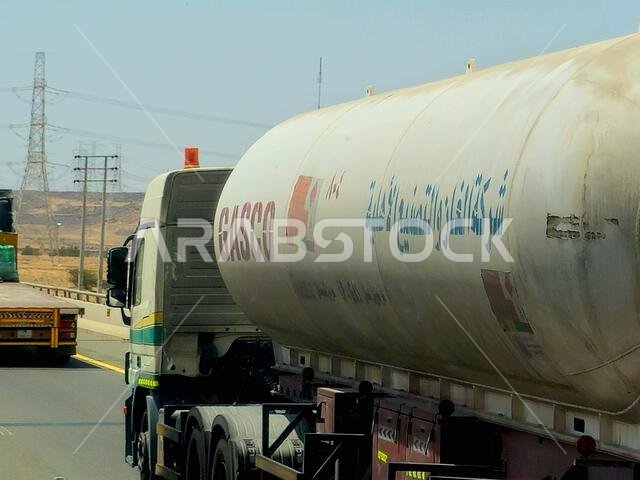 Makkah Madinah road, Saudi Arabia, June 25 2024: A big truck lorry with a container tank with fuel petroleum products, GASCO tanker National Gas and I