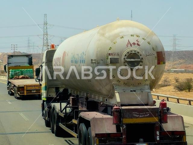 Makkah Madinah road, Saudi Arabia, June 25 2024: A big truck lorry with a container tank with fuel petroleum products, GASCO tanker National Gas and I
