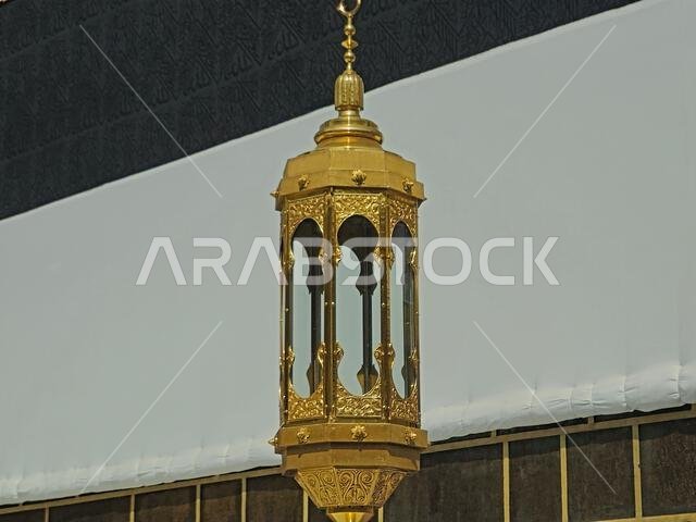 A closeup of The Kaaba, a stone building at the center of Islam's most important mosque and holiest site, the Masjid al-Haram, It's the Qibla, The dir