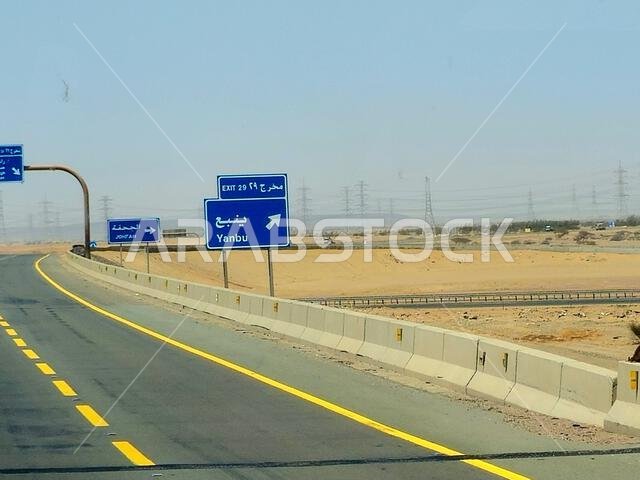 Makkah Madinah road, Saudi Arabia, June 25 2024: Yanbu road sign at Mecca Medina highway road, Tourism and pilgrimage concept in kingdom of Saudi Arab