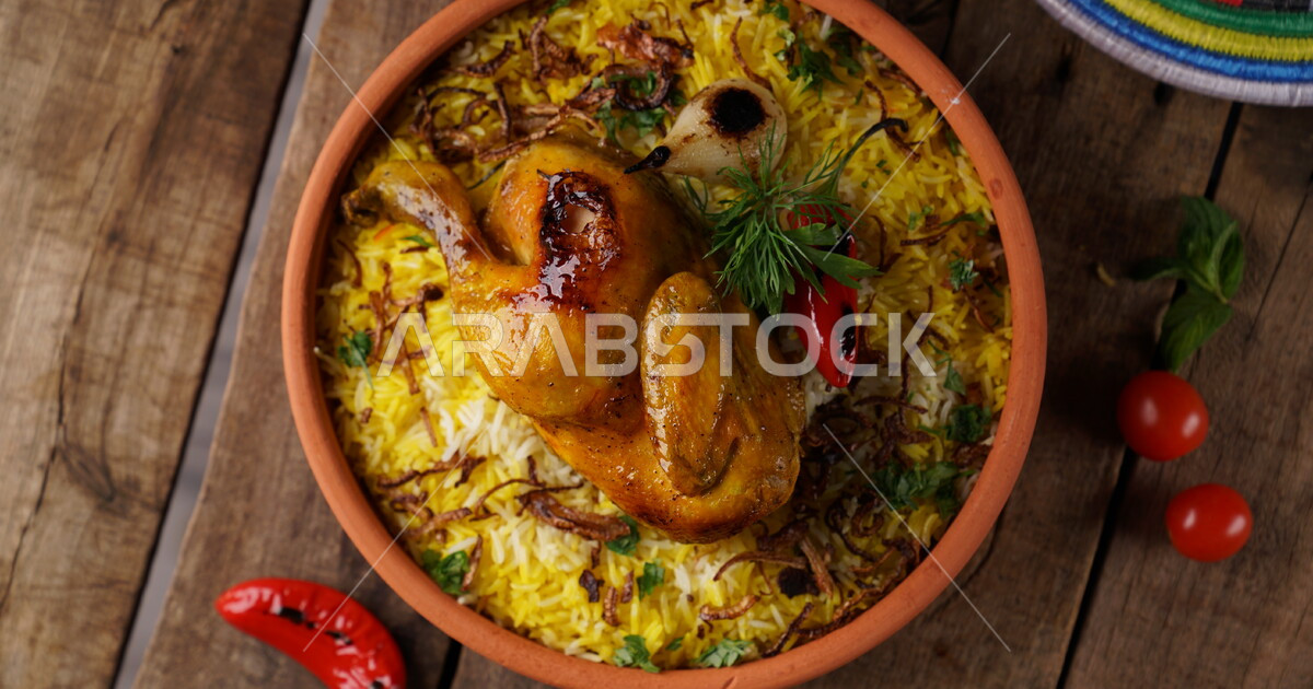 A plate of delicious mandi rice with meat, dazzling rice, traditional