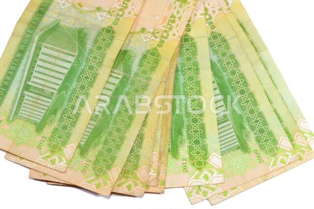 Reverse side of 1 SAR one Saudi Arabian riyal banknote features The building of the headquarters of the Saudi Arabian Monetary Agency and the arms Of