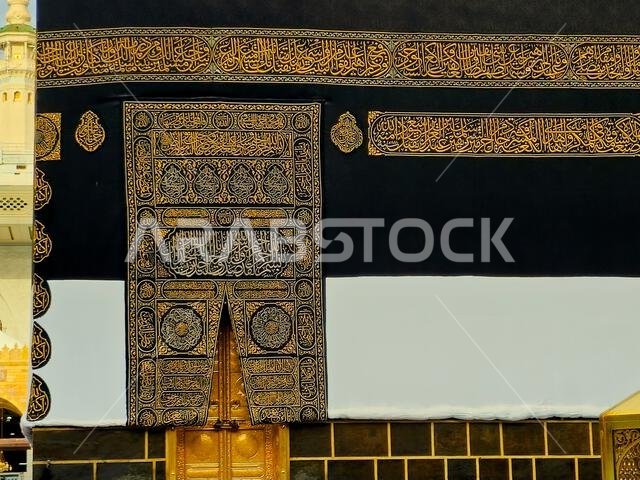 Mecca, Saudi Arabia, June 12 2024: The Golden door of The Holy Kaaba in Ihram Kiswa or clothing, a white cloth symbolizing the Ihram is put on the Kab