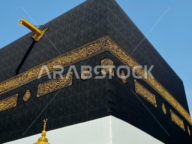 Kabaa in Ihram clothing, The Kaaba a stone building at the center of Islam's most important mosque and holiest site, the Masjid al-Haram, It's the Qib
