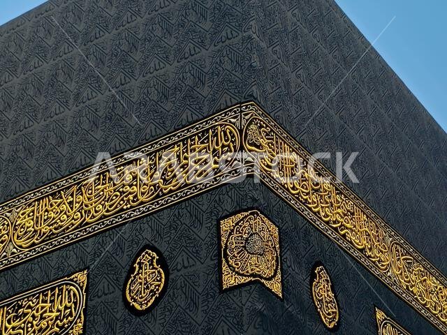 The curtains of The Kaaba a stone building at the center of Islam's most important mosque and holiest site, the Masjid al-Haram, It's the Qibla, The d The curtains of The Kaaba a stone building at the center of Islam's most important mosque and holiest site, the Masjid al-Haram, It's the Qibla, The d