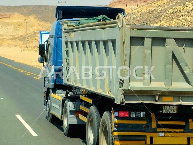 Makkah Madinah road, Saudi Arabia, June 25 2024: A transportation truck on the road for logistics and transportations of materials, for industrial and