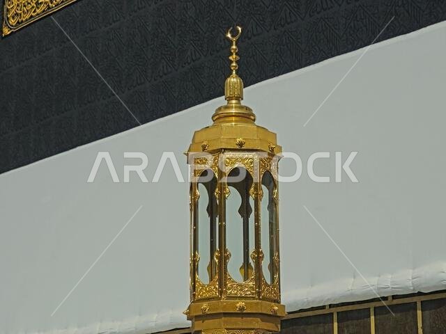 A closeup of The Kaaba, a stone building at the center of Islam's most important mosque and holiest site, the Masjid al-Haram, It's the Qibla, The dir