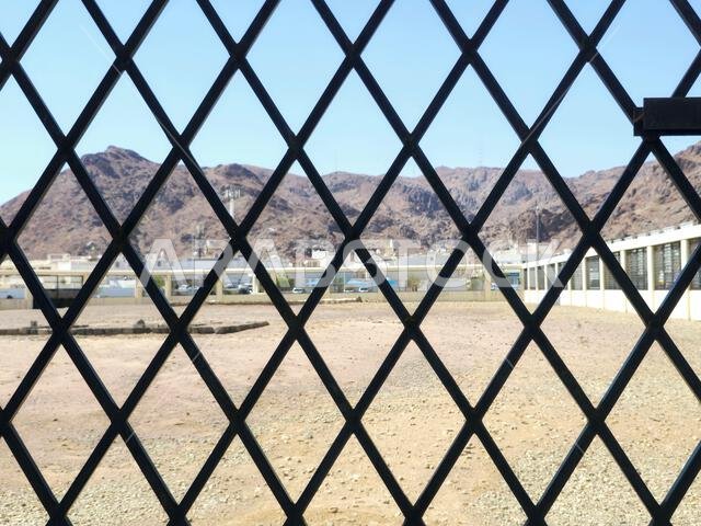 Medina, Saudi Arabia, June 27 2024: The site of the battle of Uhud, with the martyrs graves and the archers' hill, It was between the early Muslims an