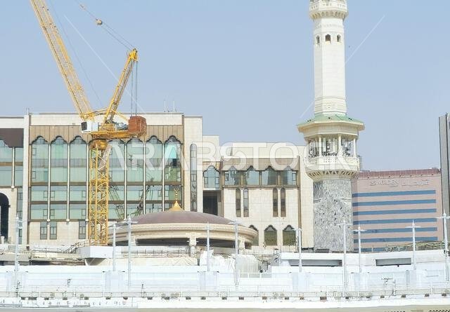 Mecca, Saudi Arabia, June 4 2024: Minarets of Al Masjid Al Haram mosque around the Kaaba in Hajj, pilgrimage, Umrah, with crane towers around it for m Mecca, Saudi Arabia, June 4 2024: Minarets of Al Masjid Al Haram mosque around the Kaaba in Hajj, pilgrimage, Umrah, with crane towers around it for m