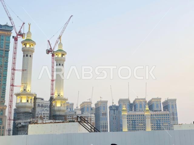 Mecca, Saudi Arabia, June 4 2024: Minarets of Al Masjid Al Haram mosque around the Kaaba in Hajj, pilgrimage, Umrah, with crane towers around it for m Mecca, Saudi Arabia, June 4 2024: Minarets of Al Masjid Al Haram mosque around the Kaaba in Hajj, pilgrimage, Umrah, with crane towers around it for m