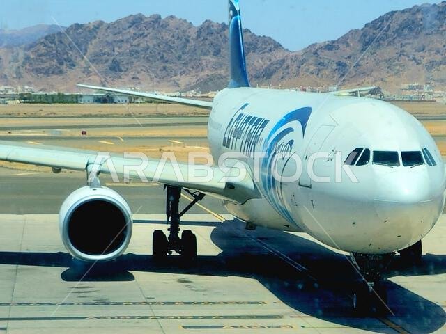 Medina, Saudi Arabia, June 29 2024: Egypt Air plane in Prince Mohammad Bin AbdulAziz International Airport, in Madinah, handles domestic and regional