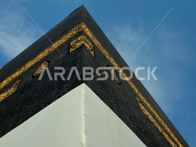 Kabaa in Ihram clothing, The Kaaba a stone building at the center of Islam's most important mosque and holiest site, the Masjid al-Haram, It's the Qib