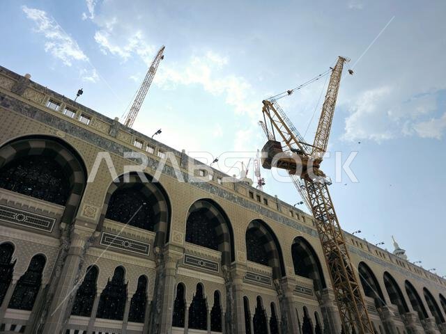 Mecca, Saudi Arabia, June 5 2024: A construction site with cranes and new building in Mecca Makkah al-Mukarramah, Makkah city, the capital of Mecca Pr Mecca, Saudi Arabia, June 5 2024: A construction site with cranes and new building in Mecca Makkah al-Mukarramah, Makkah city, the capital of Mecca Pr