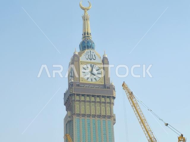 Mecca, Saudi Arabia, June 5 2024: The Clock Towers near Kaaba, a government-owned complex of seven skyscraper hotels in Mecca, a part of King AbdulAzi Mecca, Saudi Arabia, June 5 2024: The Clock Towers near Kaaba, a government-owned complex of seven skyscraper hotels in Mecca, a part of King AbdulAzi