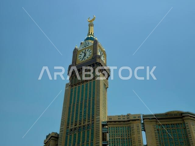 Mecca, Saudi Arabia, June 5 2024: The Clock Towers near Kaaba, a government-owned complex of seven skyscraper hotels in Mecca, a part of King AbdulAzi Mecca, Saudi Arabia, June 5 2024: The Clock Towers near Kaaba, a government-owned complex of seven skyscraper hotels in Mecca, a part of King AbdulAzi