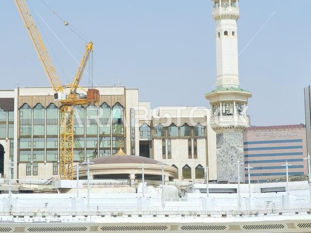 Mecca, Saudi Arabia, June 4 2024: Minarets of Al Masjid Al Haram mosque around the Kaaba in Hajj, pilgrimage, Umrah, with crane towers around it for m Mecca, Saudi Arabia, June 4 2024: Minarets of Al Masjid Al Haram mosque around the Kaaba in Hajj, pilgrimage, Umrah, with crane towers around it for m
