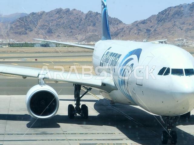 Medina, Saudi Arabia, June 29 2024: Egypt Air plane in Prince Mohammad Bin AbdulAziz International Airport, in Madinah, handles domestic and regional