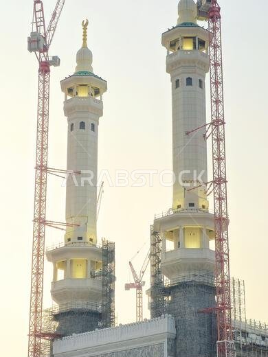 Mecca, Saudi Arabia, June 4 2024: Minarets of Al Masjid Al Haram mosque around the Kaaba in Hajj, pilgrimage, Umrah, with crane towers around it for m