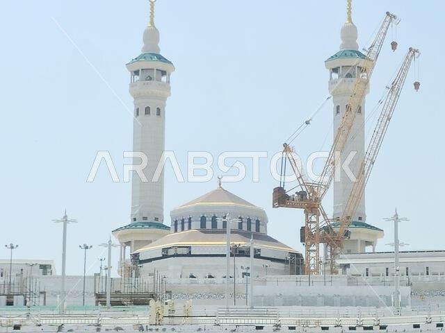 Mecca, Saudi Arabia, June 4 2024: Minarets of Al Masjid Al Haram mosque around the Kaaba in Hajj, pilgrimage, Umrah, with crane towers around it for m Mecca, Saudi Arabia, June 4 2024: Minarets of Al Masjid Al Haram mosque around the Kaaba in Hajj, pilgrimage, Umrah, with crane towers around it for m
