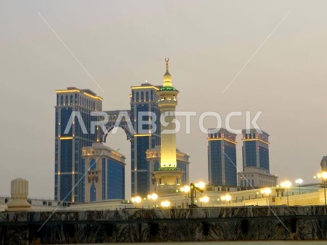Mecca, Saudi Arabia, June 4 2024: Hotel buildings that surrounds Al Masjid Al Haram, the Sacred Mosque or the Great Mosque of Mecca, is considered to Mecca, Saudi Arabia, June 4 2024: Hotel buildings that surrounds Al Masjid Al Haram, the Sacred Mosque or the Great Mosque of Mecca, is considered to