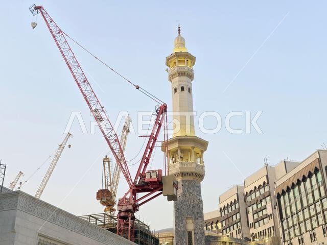 Mecca, Saudi Arabia, June 4 2024: Minarets of Al Masjid Al Haram mosque around the Kaaba in Hajj, pilgrimage, Umrah, with crane towers around it for m Mecca, Saudi Arabia, June 4 2024: Minarets of Al Masjid Al Haram mosque around the Kaaba in Hajj, pilgrimage, Umrah, with crane towers around it for m