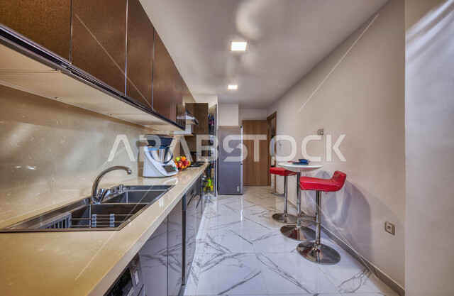 Interior design for a kitchen inside an apartment in a luxury residential complex, tourist apartments, interior designs and decorations, modern engineering architectural design