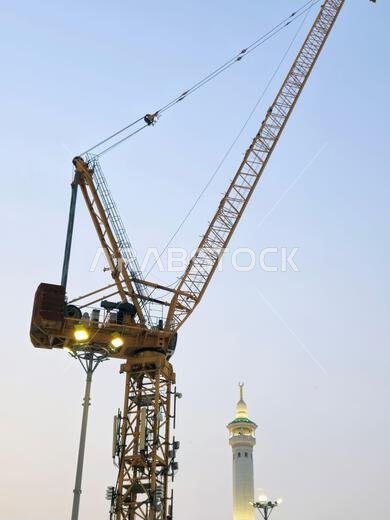 Mecca, Saudi Arabia, June 4 2024: A construction site with cranes and new building in Mecca Makkah al-Mukarramah, Makkah city, the capital of Mecca Pr Mecca, Saudi Arabia, June 4 2024: A construction site with cranes and new building in Mecca Makkah al-Mukarramah, Makkah city, the capital of Mecca Pr