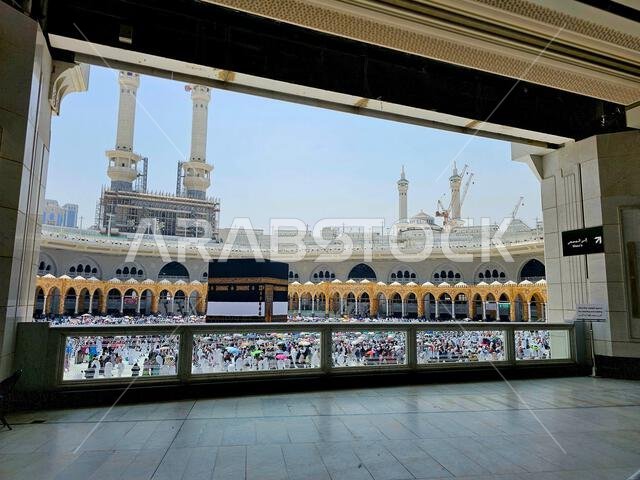Mecca, Saudi Arabia, June 4 2024: Minarets and Kaaba in Hajj, pilgrimage, Umrah, circumambulating, encircling, walk around the Holy Ka'abah seven time Mecca, Saudi Arabia, June 4 2024: Minarets and Kaaba in Hajj, pilgrimage, Umrah, circumambulating, encircling, walk around the Holy Ka'abah seven time
